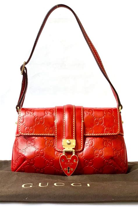 gucci guccissima heart lock bag|gucci interlocking bag small.